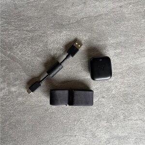 Whoop 4.0 with black band and charger